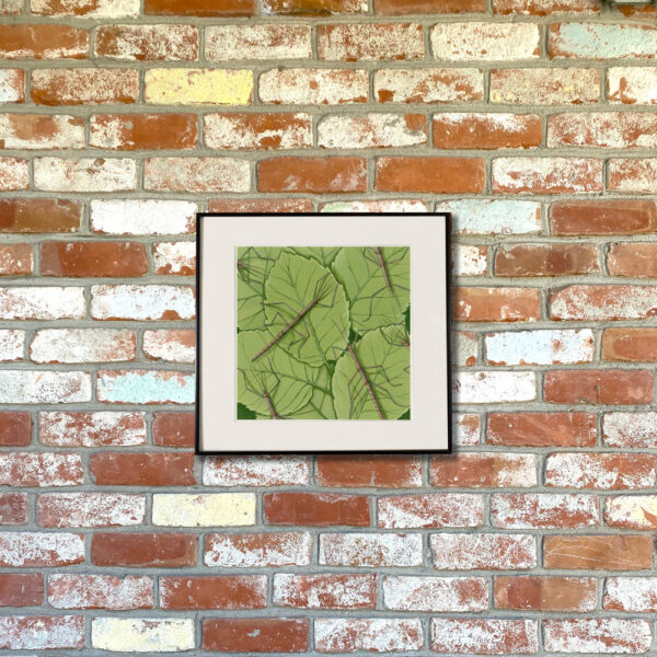 Northern Walking Stick and American Hazel Giclée Fine Art Print featuring several walking stick insects blending in with greenery below them shown matted in a frame