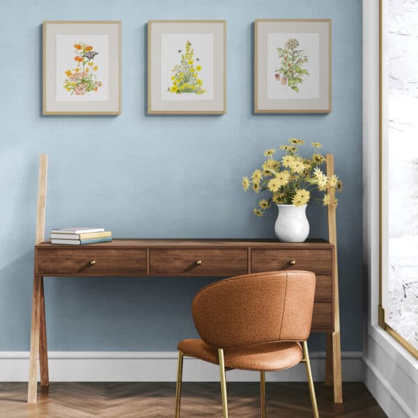 California Wildflowers in 3 colors above a work desk and leather chair